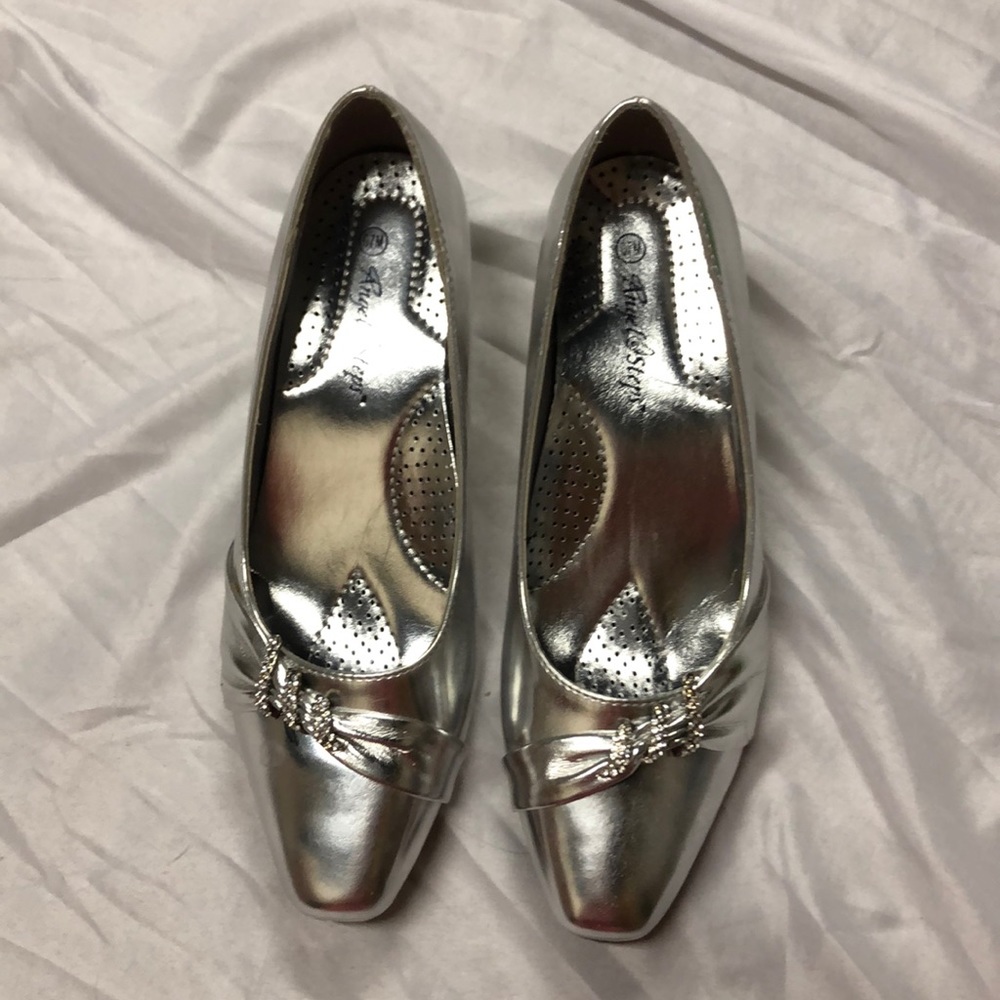 Size 7 Angel Steps silver heels.